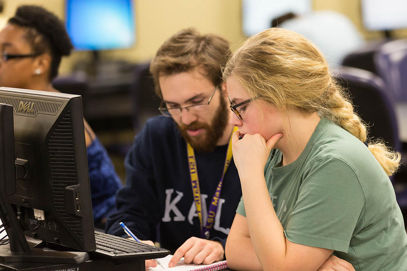 Tutor assisting a student in LSU Math Lab