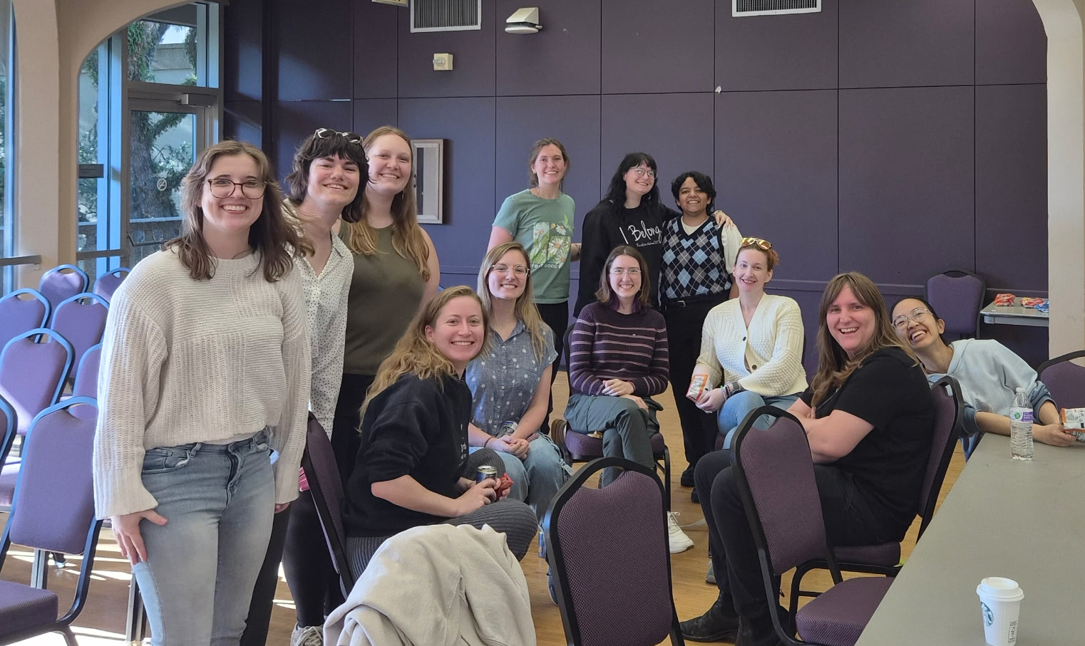 Women from multiple STEM departments smile for the camera.