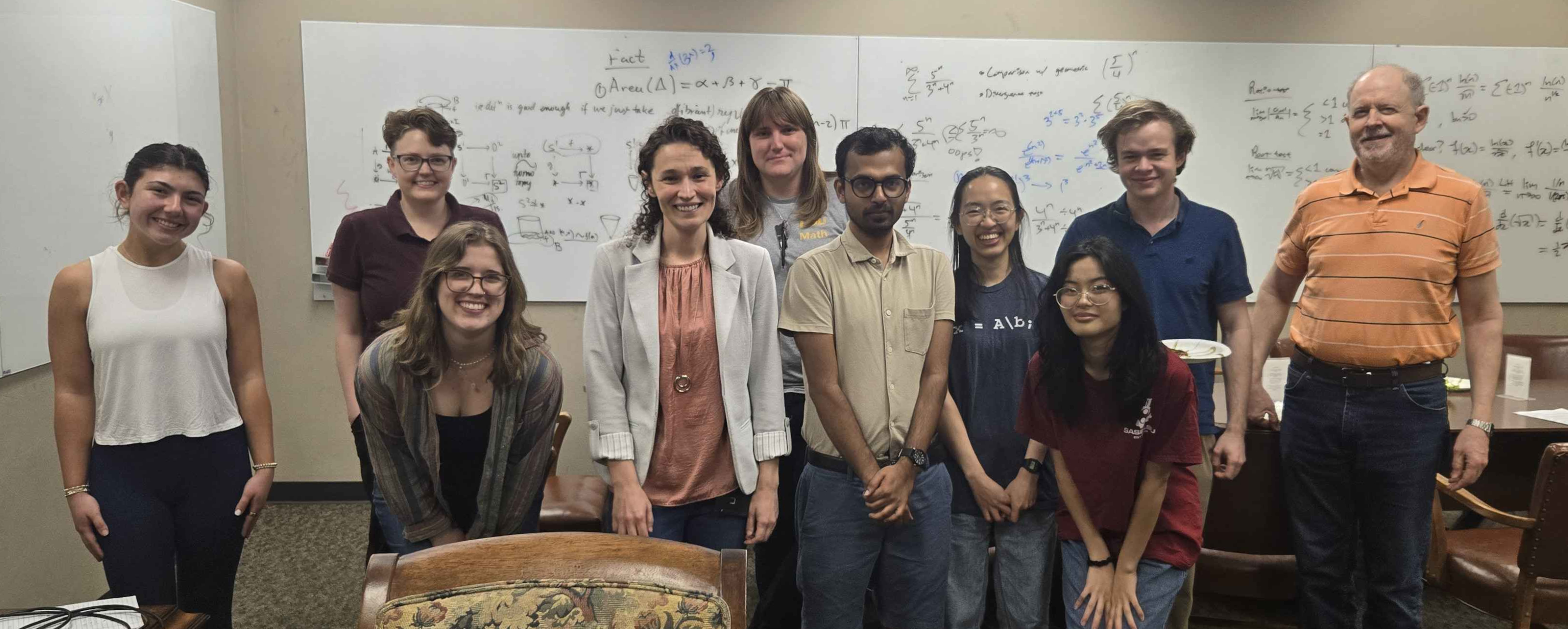 Attendees pose with Amber after the session.
