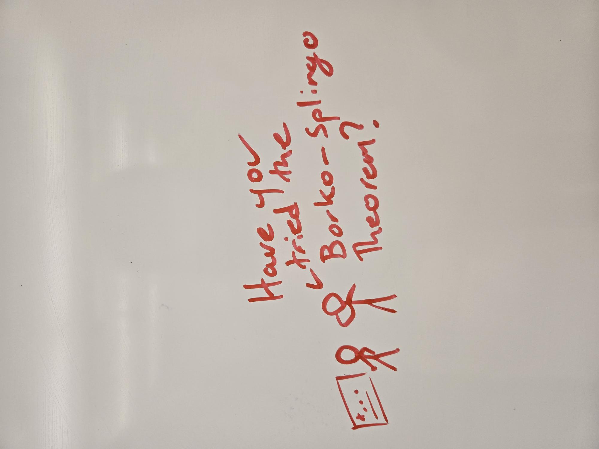 Two mathematicians discuss applying the Borko-Splingo Theorem.